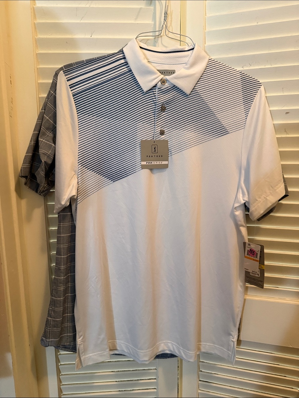 Charlotte Tilbury White Polo with Navy Diagonal Stripe Detail